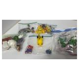 Pokemon and Collectible Figures in Bags