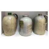 Three Stoneware Jugs with Handles