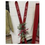 Red Wooden Skis Decor With Holiday Embellishments