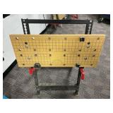 Fold-Out Worktable with Adjustable Surface