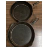 Two Cast Iron Skillets With Handles