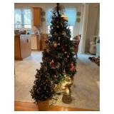 Decorated Artificial Christmas Trees and Lit Angel