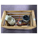 Wooden Crate with Jug, Can, and Hose