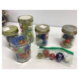 Five Glass Jars and a Bag of Assorted Marbles
