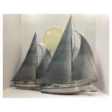 Metal Sailboat Sculptures with Sun Motif