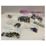 7 Packages of Assorted Glass Marbles