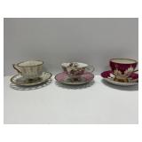 Three Porcelain Teacups and Saucers
