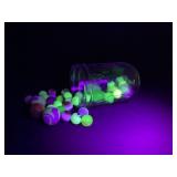 Uranium Glass Marbles in Jar