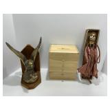 Three: Brass Eagle, Wooden Chest, and Dog Umbrella
