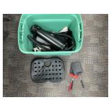 Green Storage Bin With Assorted Household Items