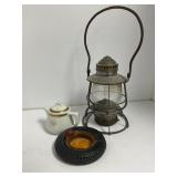 Railway Lantern, Porcelain Teapot, and Tire Ashtra