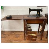 Singer Sewing Machine in Wood Cabinet with Accesso
