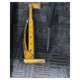 Yellow Metal Car Jack with Rust Patina