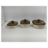 Three CorningWare Dishes with Lids