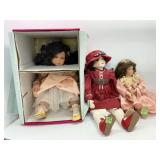 Three Porcelain Dolls with Clothing and Accessorie