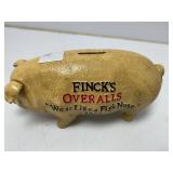 Cast Iron Pig Bank with Finck's Overalls Advertisi