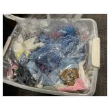 Plastic Bin Containing Assorted Fabric Pieces