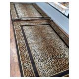 Two Cheetah-Pattern Rugs