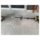 Gas-Powered String Trimmer with Yellow Engine Hous