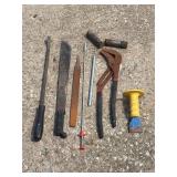 Prybar, machete, file, grabber, channel locks ...