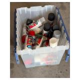 Tub full of spray, paints, and primers