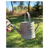 Small copper watering can