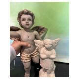 Decorative Angels (plaster hanging; stone statue)