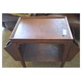 Table with magazine rack on each end