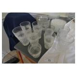 4 tea glasses, 4 water, 1 juice, 13 plates, ice