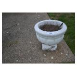 2 white concrete flower pots