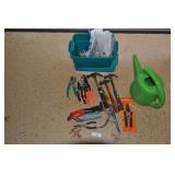 Hammer, pruners, drop cloths