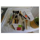 Crock with lots of utensils