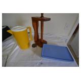 Pitcher, paper towel holder, tupperware bacon