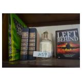 Misc books, bottle, vase