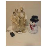 Nativity scene, snowman