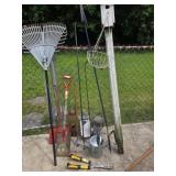 Leaf rake, watering can, shovel, owl, pruners,