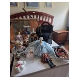 Glue gun, magazine rack, books, mirror, dolls,