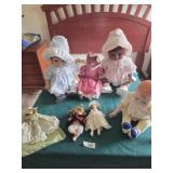 2 tiny baby porcelain dolls and small dolls