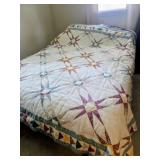 Hand stitched eight-pointed star pattern