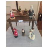 Table with wood and Asian sculpture, figurines