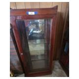 51 tall by 23 wide curio cabinet