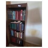 58 tall by 24 wide bookcase with misc books
