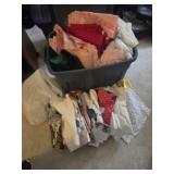 Tupperware full of quilting material