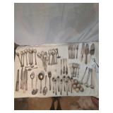 Assortment of spoons, forks, some Rogers