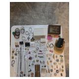 Pendants, compacts, necklaces, bracelets,