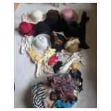 10 hats, lots of dress gloves, scarves