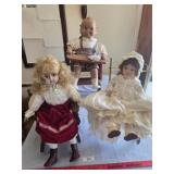 Kewpie doll, 2 other dolls with chairs