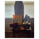 Empty sewing cabinet, 2 cloaks, apron, sewing box