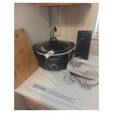 Crock pot, can opener, mixer, cutting board
