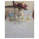 Figurines, vase of flowers